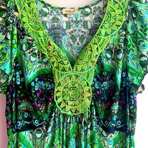 One world live and let live , lime green dress